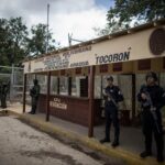 Rehenes del Cecot | El Tren de Aragua y su peso en la estigmación de la migración venezolana 
